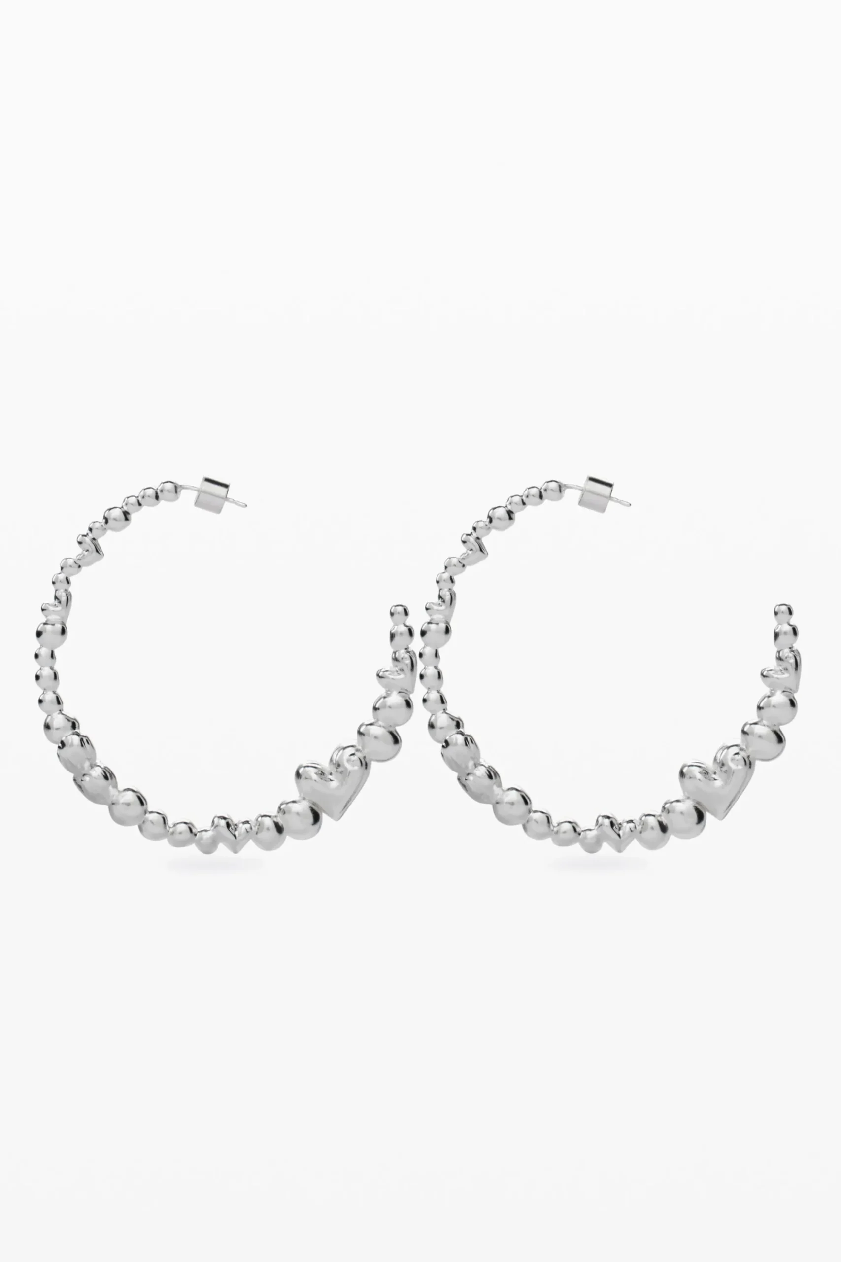Joyería-Desigual Pendientes aro corazones bañado en plata Zalio