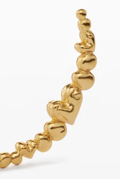 Joyería-Desigual Pendientes aro corazones bañado en oro Zalio